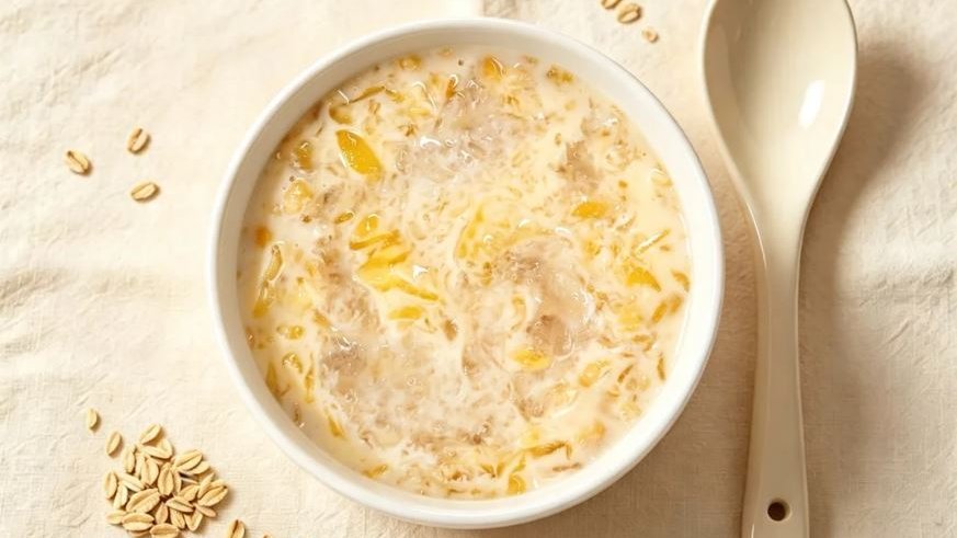Mango bird nest sago congee tropical breakfast bowl with grains